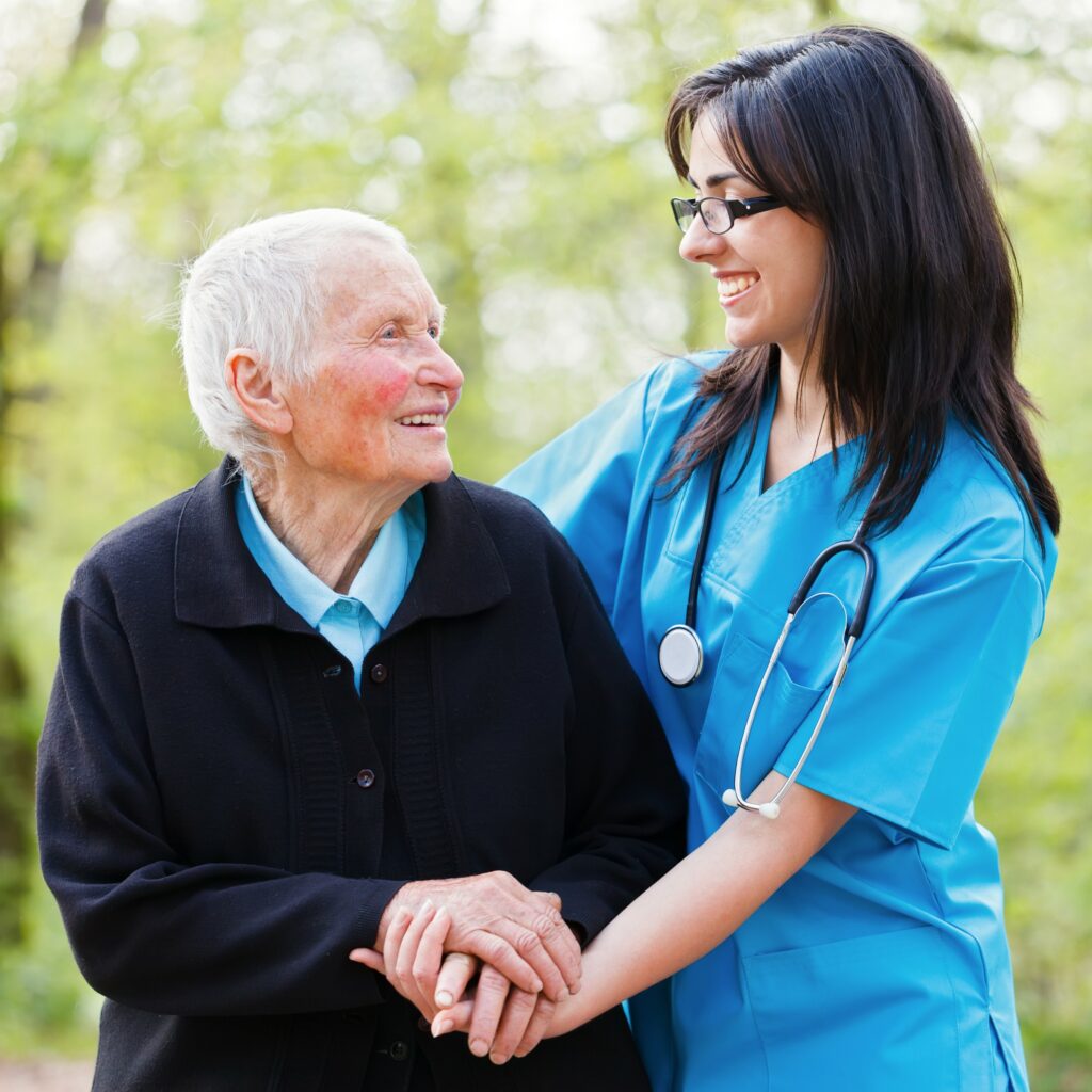 Happy patient speaking with a reassuring doctor.